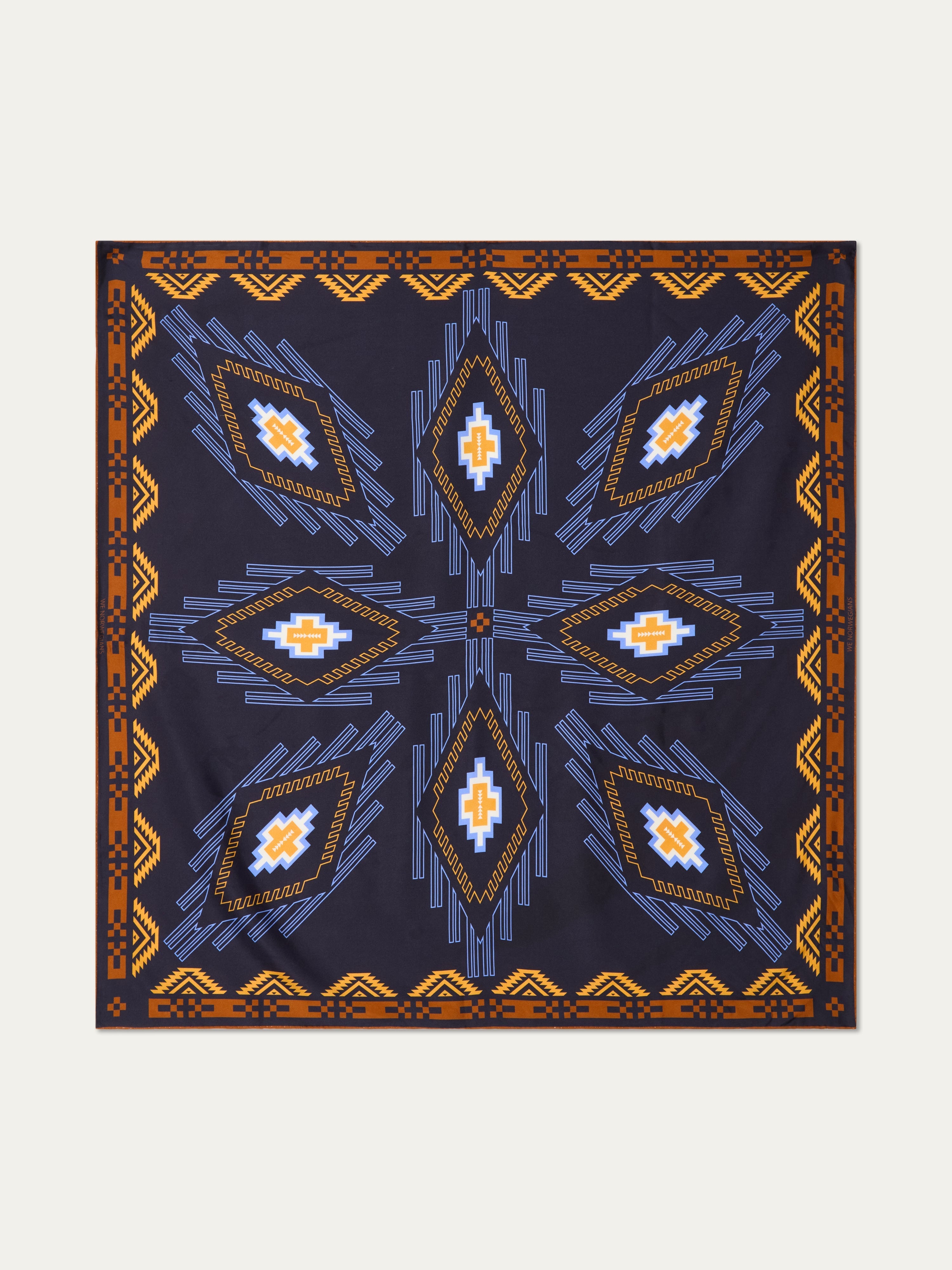 We Norwegians | FW25 | Pioneer Silk Scarf_Navy blue | Scarf with printed motifs | Shot against an off-white background